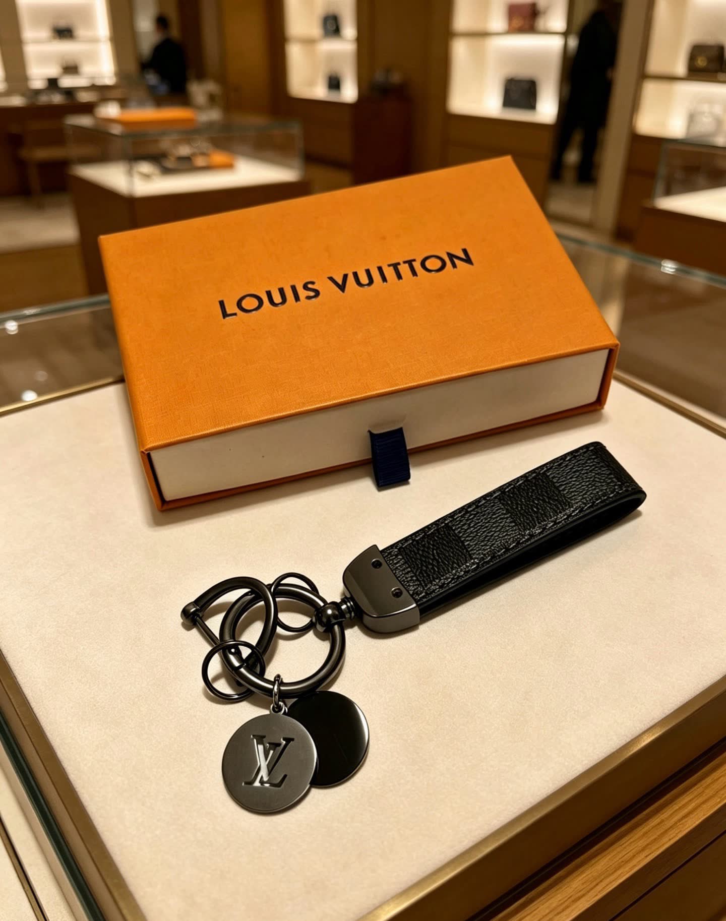 Louis Vuitton Keychain with Leather Strap
